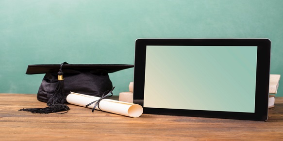 Graduation! Cap, Motarboard, Diploma, Digital Tablet On Desk. Education.